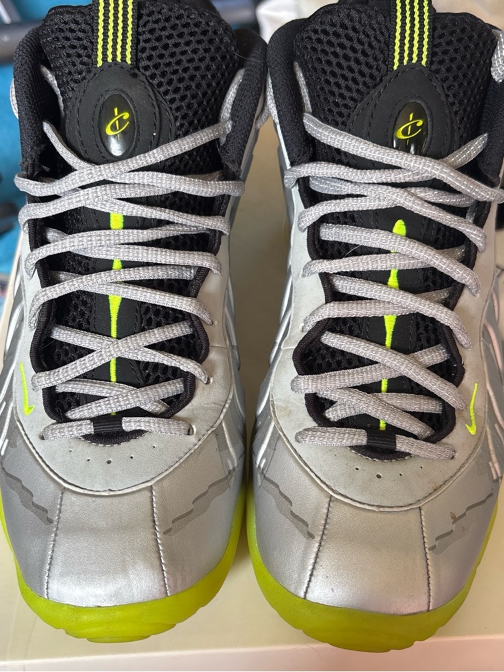 Silver and Neon Green Athletic Sneakers Nike foamposite
